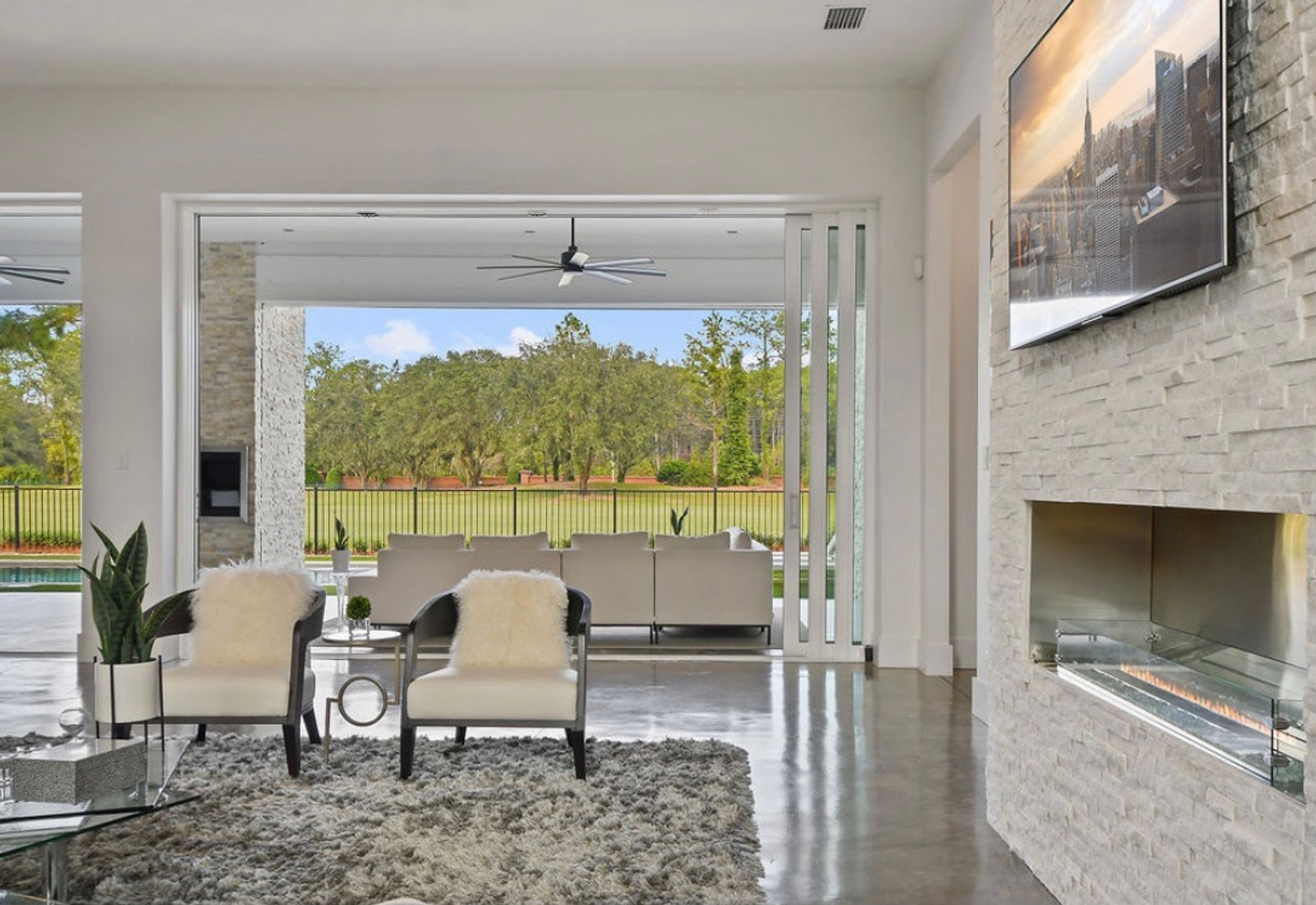Bishman Development open living to pool