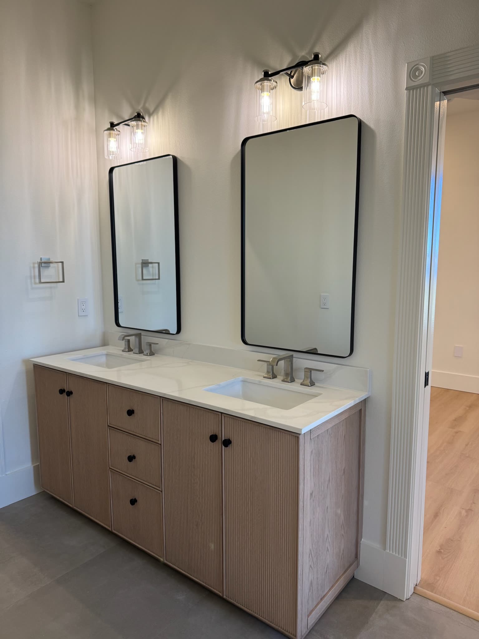 Guest bath with rift oak vanity and stone top