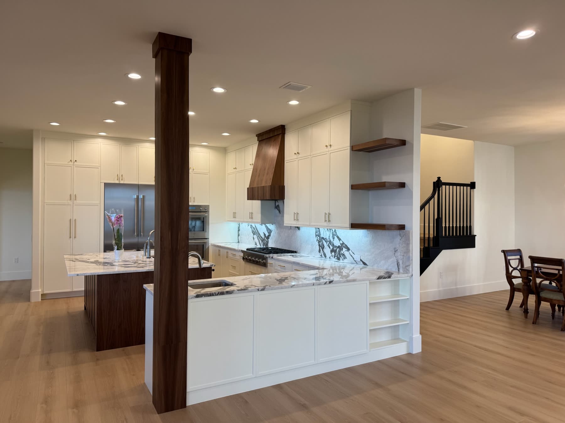 Renovated kitchen looking toward the stair hall